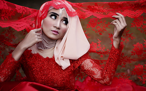woman in red floral long-sleeved dress thumbnail