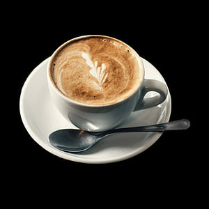 ceramic cup filled with coffee on saucer beside teaspoon thumbnail