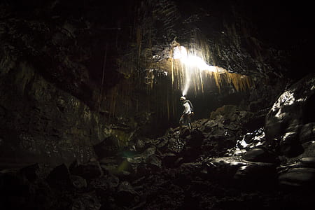 person under cave thumbnail