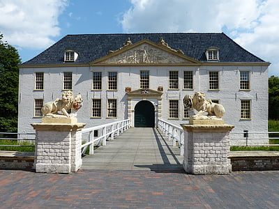 white mansion with blue roof thumbnail