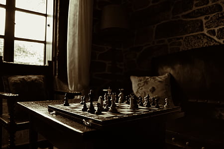chessboard set on table inside room thumbnail
