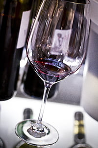 close-up photography of footed glasses filled with liquid thumbnail