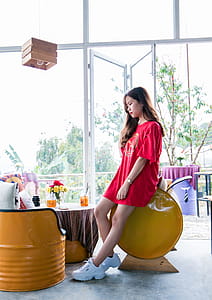 Woman Wearing Red Short-sleeved Dress thumbnail