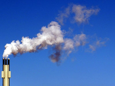 smoke coming out of brass-colored chimney thumbnail
