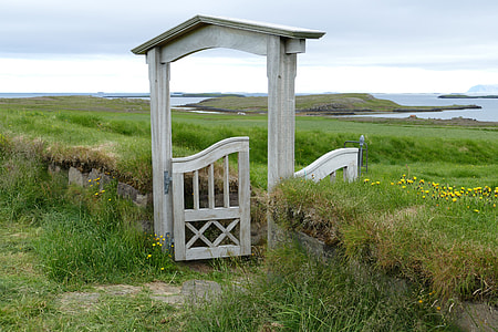 white wooden doorway fence near grass field thumbnail