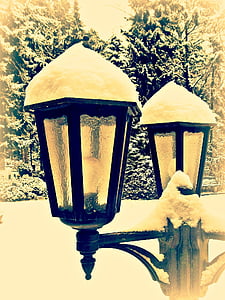 snow-covered black post lamp thumbnail