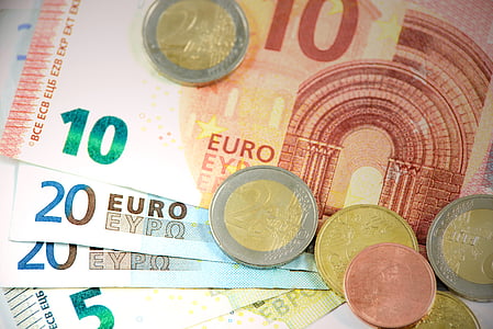 Euro banknotes and coins thumbnail
