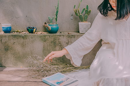 Woman In White Long-sleeved Dress thumbnail