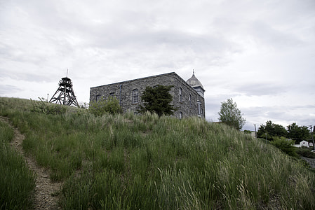 Fire tower and stone building perched on a hill in Helena thumbnail