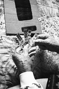 person holding cards thumbnail