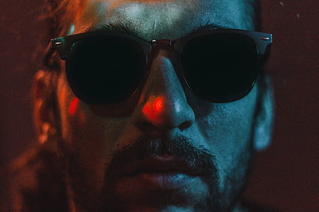 portrait photo of of man wearing sunglasses thumbnail