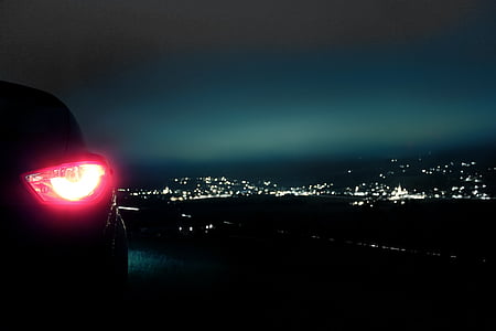 turned-on vehicle taillight thumbnail