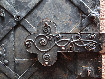 close-up photo of black scroll metal panel thumbnail