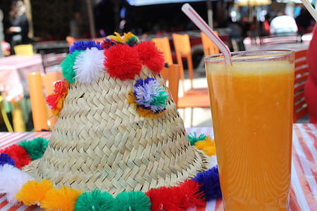 orange juice on clear highball glass thumbnail