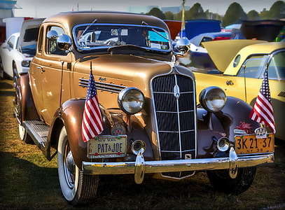 classic brown vehicle parked thumbnail