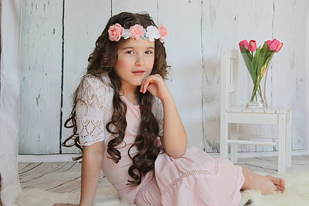girl sitting while posing thumbnail