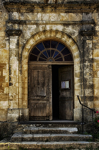 brown wooden door during daytime thumbnail
