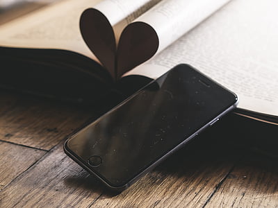 space gray iPhone 6 leaning on book thumbnail