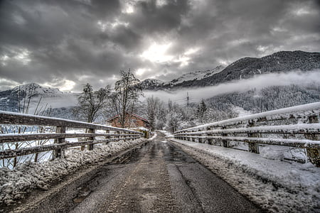 winding road with snow photo thumbnail