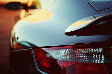 close up photography of black sports coupe thumbnail