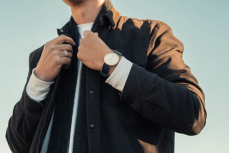 man in black button-up suit and white shirt thumbnail