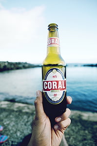 person holding 1872 Coral Cerveta 20 bottle thumbnail