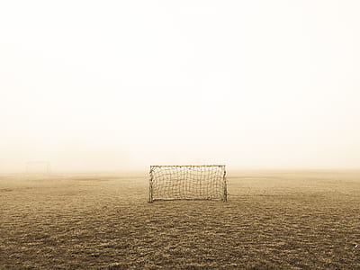 gray goal net on grassfield thumbnail