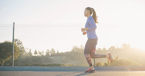 woman jogging on street thumbnail