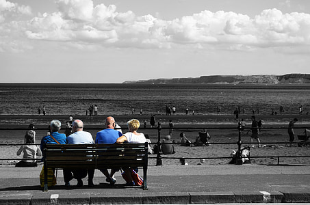 selective photo of people sitting on bench thumbnail