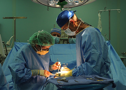 man and woman wearing surgical suits thumbnail