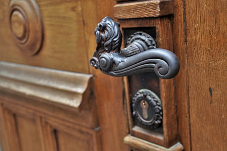 close-up photography of grey metal door lever thumbnail
