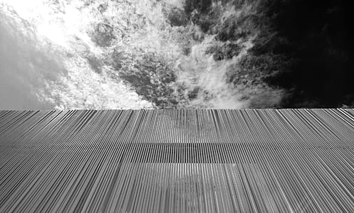 grayscale photo of clouds at daytime thumbnail