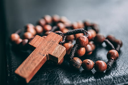 brown rosary close-up photography thumbnail