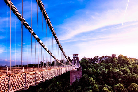 brown bridge under blue sky during day time thumbnail