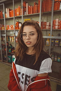 woman standing near steel shelf thumbnail