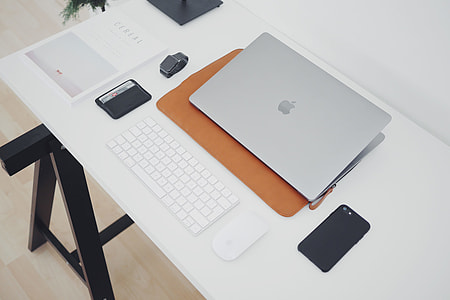 Office desktop with laptop and iPhone thumbnail