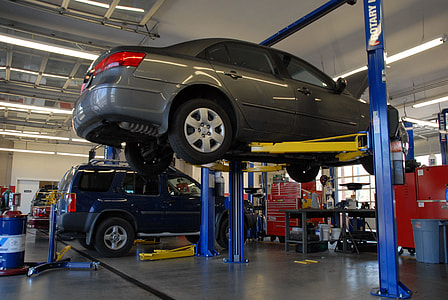 gray sedan on automotive raiser thumbnail