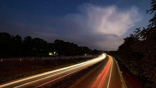 timelapse photography of cars on road thumbnail
