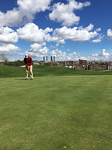 man doing golf under cloudy sky thumbnail
