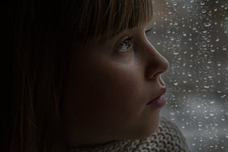 brown hair girl looking to the glass thumbnail