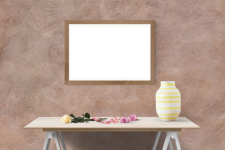 brown wooden framed white wall decor above white wooden table thumbnail