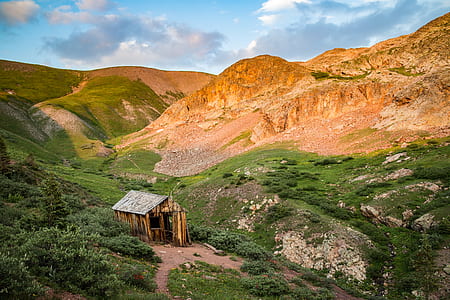 hut on mountain slope thumbnail