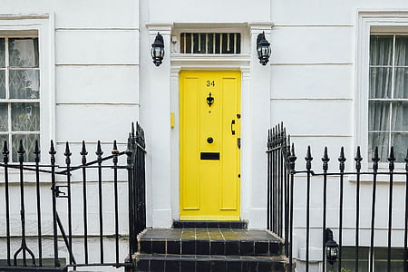 yellow door with gate thumbnail