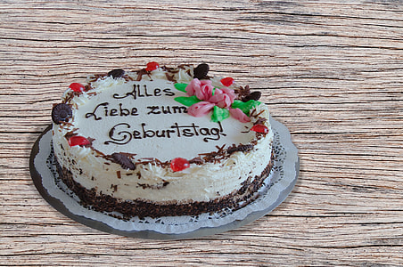 cake on gray platter above wooden surface thumbnail
