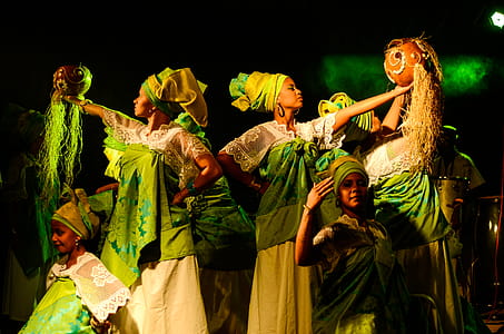 Group of Women Wearing Green-and-white Dresses thumbnail