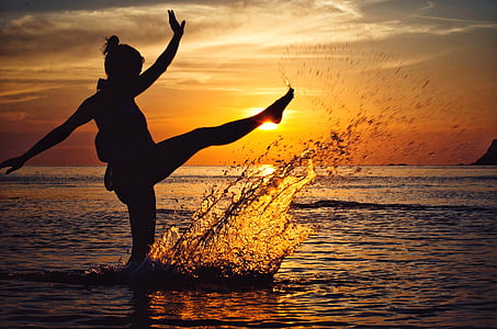 silhouette of woman raising her right feet thumbnail