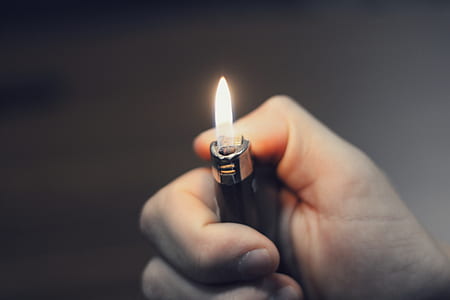 lighted black Bic disposable lighter thumbnail