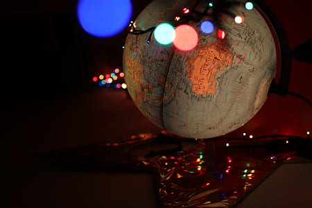bokeh photography of desk globe thumbnail