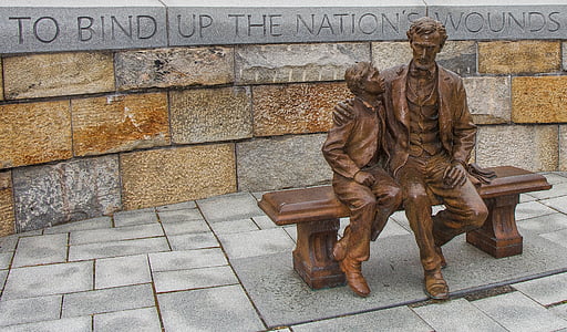 to bind up the nation's wounds brown statue at daytime thumbnail