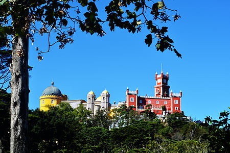 red castle on mountain thumbnail